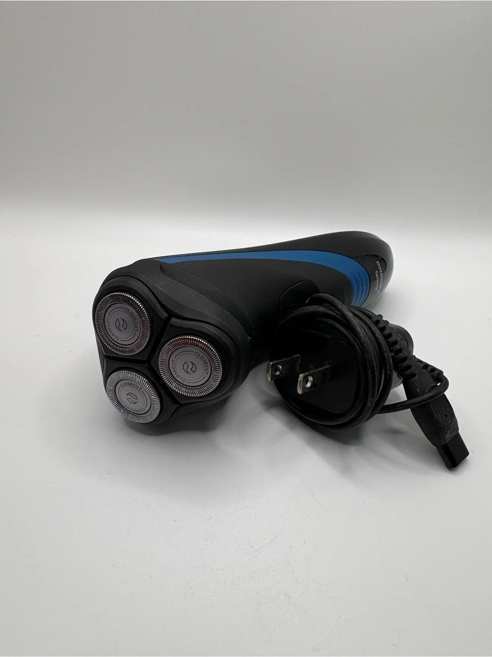 Philips Norelco Shaver 2100 cordless electric rotary razor in black with blue ac